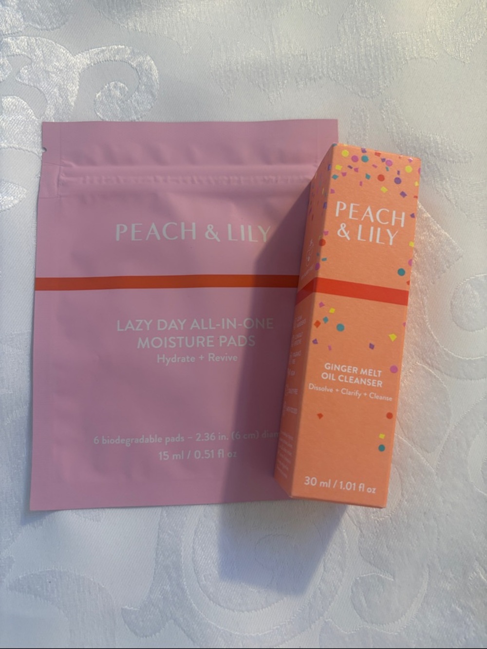 Peach & Lily Ginger Melt Oil Cleanser, and Lazy Day all-in-one Moisture Pads